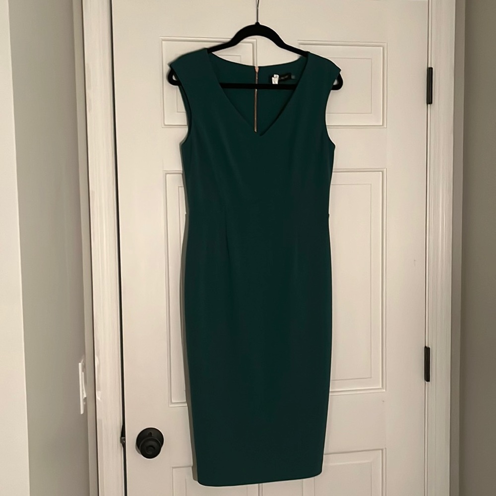 Dark green dress.  Perfect for office or client meetings!